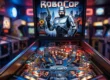 Vista detalhada do playfield da máquina de pinball RoboCop da Data East, destacando a rampa de salto e a arte do ED-209.